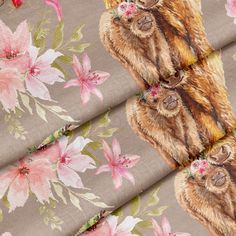 the fabric has bears on it and pink flowers