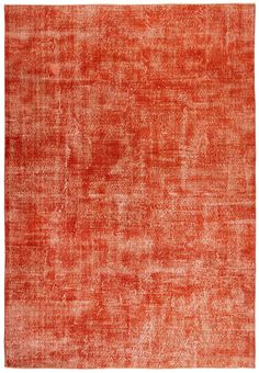 an orange rug with faded edges