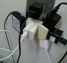 an electrical outlet is plugged into the wall with two wires attached to each outlet