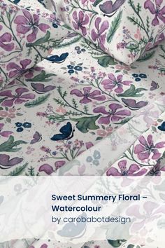 an image of a flowery fabric with purple and blue flowers on it, in the background