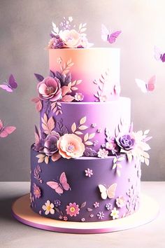 a three tiered cake with purple and pink flowers on it, surrounded by butterflies