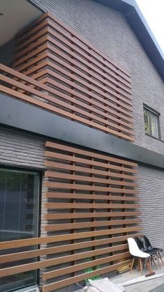 a house that has wooden slats on it