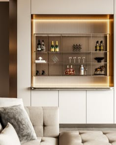 a living room filled with furniture and lots of bottles on the wall above it's shelves