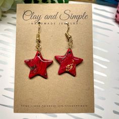 Clay And Simple Star Earrings. Made With Premium Polymer Clay And Hypoallergenic Materials. Star Design With Gold Flakes. Sealed With Resin For Durability And Shine. Made With Lightweight Materials. Handcrafted Myself I Hope You Enjoy Them As Much As I Do! Nickel-free Red Star Earrings, Red Star-shaped Nickel-free Earrings, Handmade Red Star Jewelry, Red Star-shaped Jewelry For Gift, Red Star-shaped Jewelry Gift, Red Star-shaped Jewelry For Parties, Red Star-shaped Party Jewelry, Red Star-shaped Earrings For Party, Red Star-shaped Party Earrings