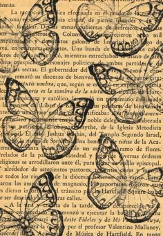 an old book with butterflies on it and some words written in spanish above the image