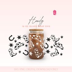 a glass jar filled with lots of different types of items on top of a pink background