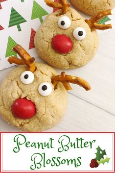 two cookies decorated to look like reindeers with googly eyes and antlers on them