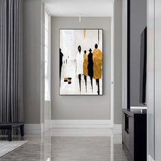 an abstract painting hangs on the wall in a modern living room with gray walls and flooring