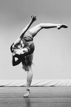 Black and white dancer doing a back attitude release on stage Dance Leg Hold, Flexibility Poses Photography, Dance Photography Outfits, Leg Dance Poses, Dancer Action Shots, Black And White Dance Photography, Cute Dance Poses, Cool Dance Poses, Contemporary Dance Photography Poses