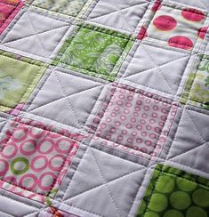 a close up view of a patchwork quilt