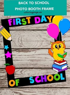 the back to school photo booth frame is decorated with balloons, books and an owl