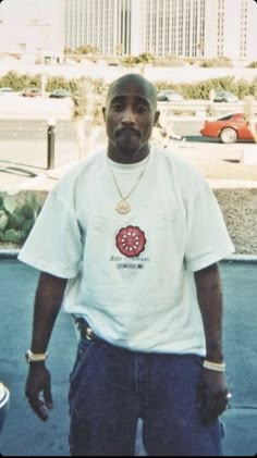 a man standing in front of a parking lot