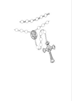 a rosary with a crucifix on it and a cross hanging from the side