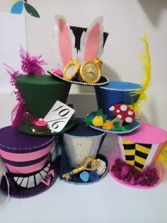 several hats are stacked on top of each other