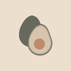 an avocado is shown on a beige background