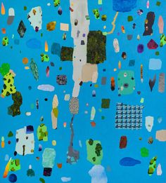 an abstract painting with many different shapes and sizes on blue paper, surrounded by smaller objects