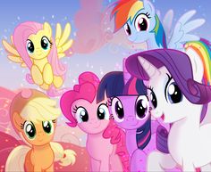 a group of little pony standing next to each other