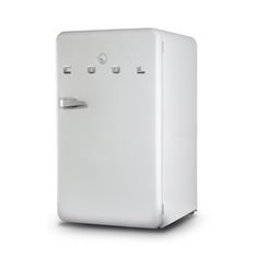 a white refrigerator freezer sitting on top of a white floor next to a wall