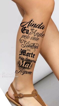 a woman's legs with tattoos and words on the side of her leg,