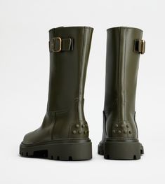 Biker boots in semi-shiny leather, with branded metal side buckle. Featuring the iconic rubber pebbles on the heel, they are characterized by a rubber lugged outsole. An urban passe-partout with a bold and refined touch at once. Leather Biker Boots, East Hampton, Biker Boots, Boots For Women, Womens Boots, Buckle, Boots, Heels, Green