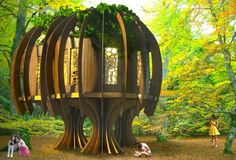 an artistic rendering of a tree house in the middle of a forest with people standing around it