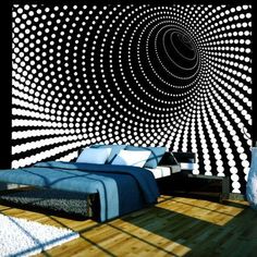 a bed sitting in a bedroom next to a wall with circles on it's walls