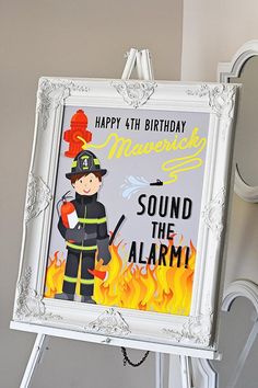 a birthday card with a fireman in front of a sign that says, happy 44th birthday mommy sound the alarm