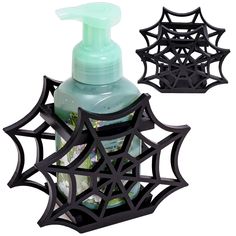 a soap dispenser with spider web design