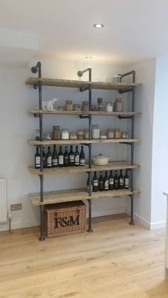 an empty room with shelves filled with bottles