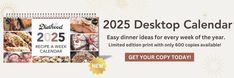 a desktop calendar with images of food on it