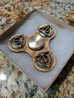 a wooden fidget sitting on top of a counter