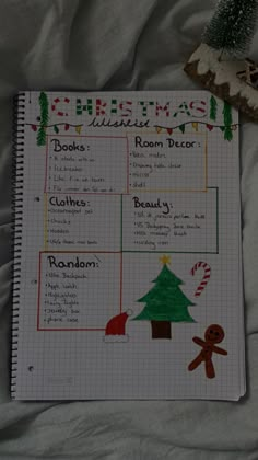 a christmas planner is shown on a sheet of paper next to a gingerbread tree