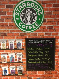 there is a sign on the wall that says starbucks's iced now - fiction