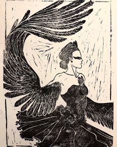 a black and white drawing of a woman with wings