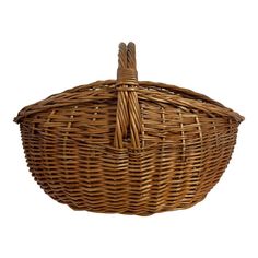 an empty wicker basket with handles on a white background