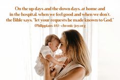 a woman holding a baby in her arms with a quote from the bible on it