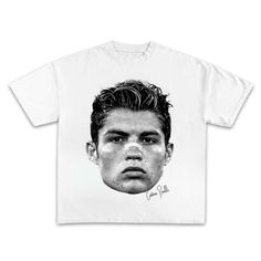 a white t - shirt with a drawing of a young man's face