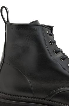 Tonal branding adds subtle charm to a high-top boot grounded by a lugged rubber sole for enhanced traction no matter where the day takes you. 5" shaft Lace-up style Leather upper and lining/rubber sole Made in Portugal High-top Lace-up Boots With Vibram Sole For Workwear, Allsaints Black Ankle Boots, Casual Leather Boots By Allsaints, Allsaints Casual Leather Boots, Casual Allsaints Boots With Round Toe, Lug Sole Boots, High Top Boots, Nordstrom Store, Anniversary Sale