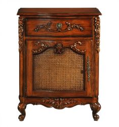 an ornate wooden cabinet with wicker doors and drawers on the bottom, side view