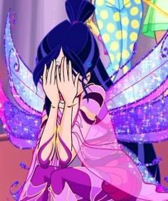 an anime character sitting on the ground with her hands to her face