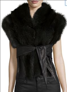 Rick Owens Hun Leather Fox Fur Vest. This winter, keep warm in style with Rick Owens. This fur and leather vest features black fox with green undertones, and an optional tie front waist. Whether you are braving the windy concrete jungle, or skiing in Gstaad, we’ve got you covered. Retail $11,000. Size 6. Pre-owned excellent condition. Fox Fur Vest, Black Fox, Innovative Fashion, Concrete Jungle, Leather Vest, Fur Vest, Fox Fur, Bergdorf Goodman, Sweater Accessories