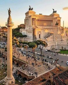 an aerial view of the roman forum in rome, italy at sunset with traffic and pedestrians