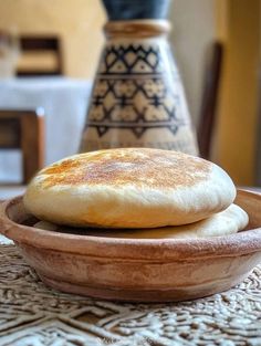 some bread in a bowl on a table