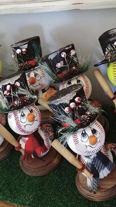 some baseball themed items are sitting on the shelf in front of other decorations and balls