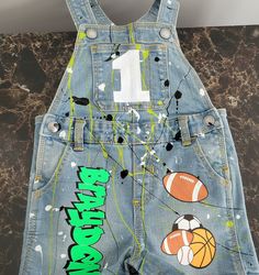 Personalized themed overall jean shorts.  Long pants  also available,  choose theme and paint color.  Add personalization in comments Decorated Overalls For Football, Aggie Painted Overalls, Overalls For School Spirit, School Spirit Overalls Homecoming, Painted Overalls School Spirit, Painted Overalls, Short En Jean, Jeans Shorts, Long Pants