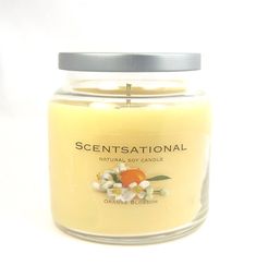 a candle that is sitting on a white surface with the words, scentational