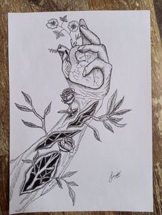 a drawing of a hand holding a clock on top of a branch with leaves and flowers