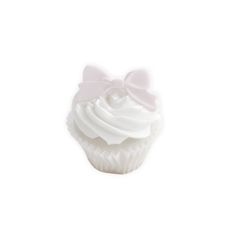 a cupcake with white frosting and a pink bow