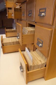 several filing cabinets with drawers and file folders