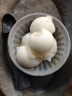 three scoops of ice cream in a bowl